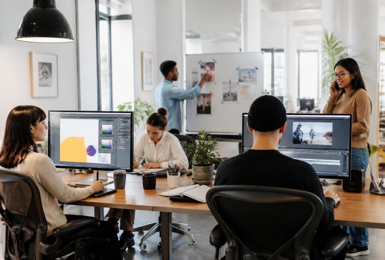 A traditional marketing team working across design, ads, SEO and social — the department you no longer need to hire